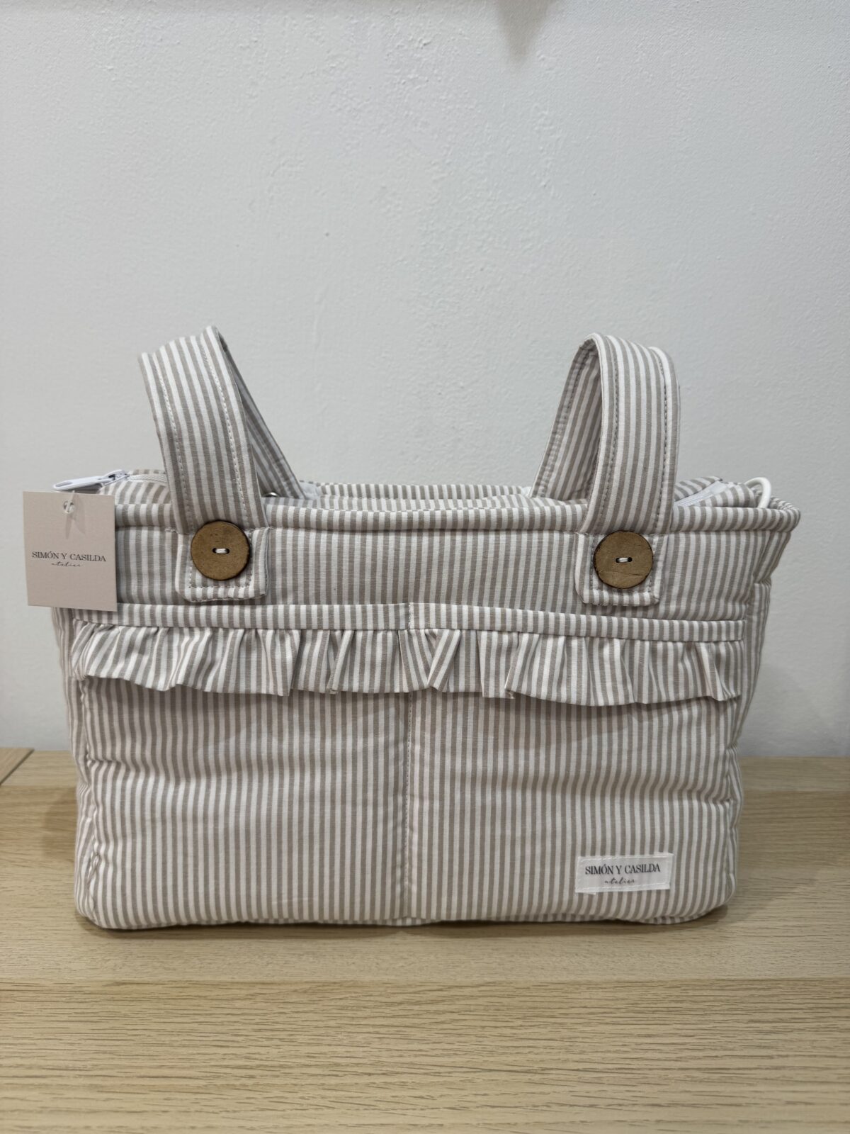 Bolso organizador con volante rayas beige